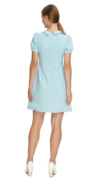 Update your spring wardrobe with our Retro Style Light Blue dress with Faux Button Down Placket. Made from quality heritage mill Spanish fabric, this dress offers comfort and style. Available in various sleeve lengths; it's perfect for any occasion. Shop now in other colors from this season's palette!