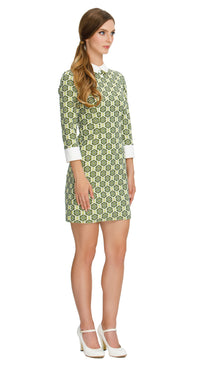 Step into timeless elegance with our Fitted, Shades of Green Floral Pattern Sixties Dress; perfect for both work and play. This dress features a charming floral pattern in shades of green, offering a delightful retro aesthetic. With three-quarter length cuffed sleeves and a classic white collar, it exudes vintage charm.