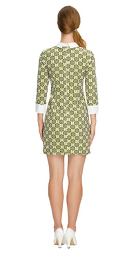 Step into timeless elegance with our Fitted, Shades of Green Floral Pattern Sixties Dress; perfect for both work and play. This dress features a charming floral pattern in shades of green, offering a delightful retro aesthetic. With three-quarter length cuffed sleeves and a classic white collar, it exudes vintage charm. 