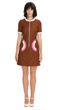 Step back in time with our sixties style, Autumn Dress with Two-Tone Half Circle Pockets; a playful nod to retro fashion that's perfect for any season. This dress captures the essence of the era through its color palette, charming detailing, and delightful playfulness. The front looped zipper closure adds a touch of authenticity, while the short sleeves and traditional rounded neck maintain the timeless appeal.