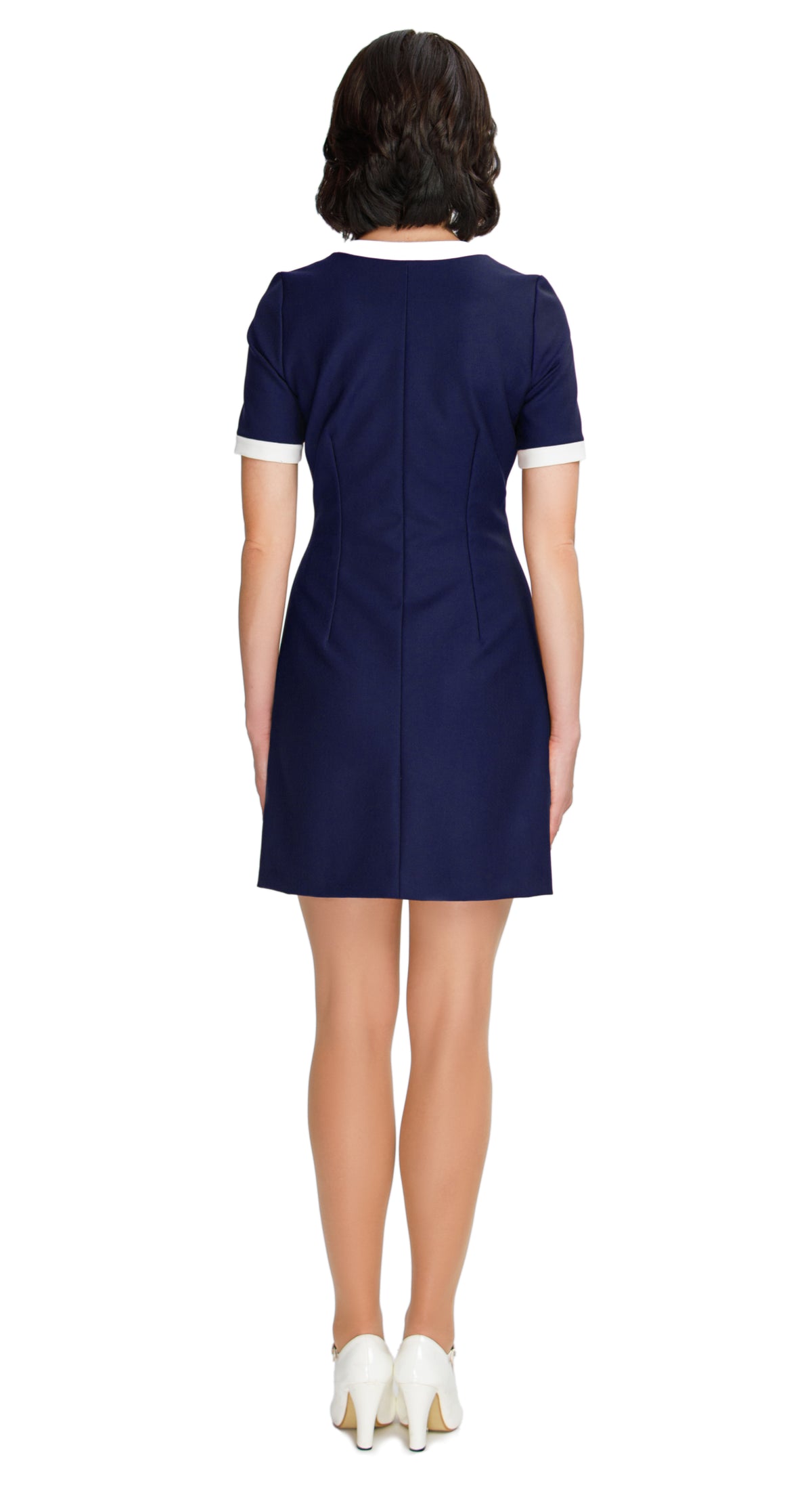 Step back in time with our sixties style, Autumn Dress with Two-Tone Half Circle Pockets; a playful nod to retro fashion that's perfect for any season. This dress captures the essence of the era through its color palette, charming detailing, and delightful playfulness. The front looped zipper closure adds a touch of authenticity, while the short sleeves and traditional rounded neck maintain the timeless appeal.