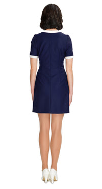 Step back in time with our sixties style, Autumn Dress with Two-Tone Half Circle Pockets; a playful nod to retro fashion that's perfect for any season. This dress captures the essence of the era through its color palette, charming detailing, and delightful playfulness. The front looped zipper closure adds a touch of authenticity, while the short sleeves and traditional rounded neck maintain the timeless appeal.
