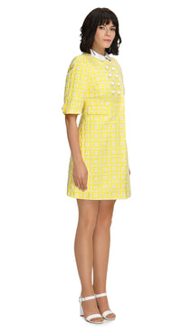 Elevate your spring style with our Vibrant Sunshine Yellow Coat, crafted from a French heritage mill jacquard. Pair it with our Vibrant Sunshine Yellow Pattern Shift Dress for a charming spring set. Shop now for instant elegance!
