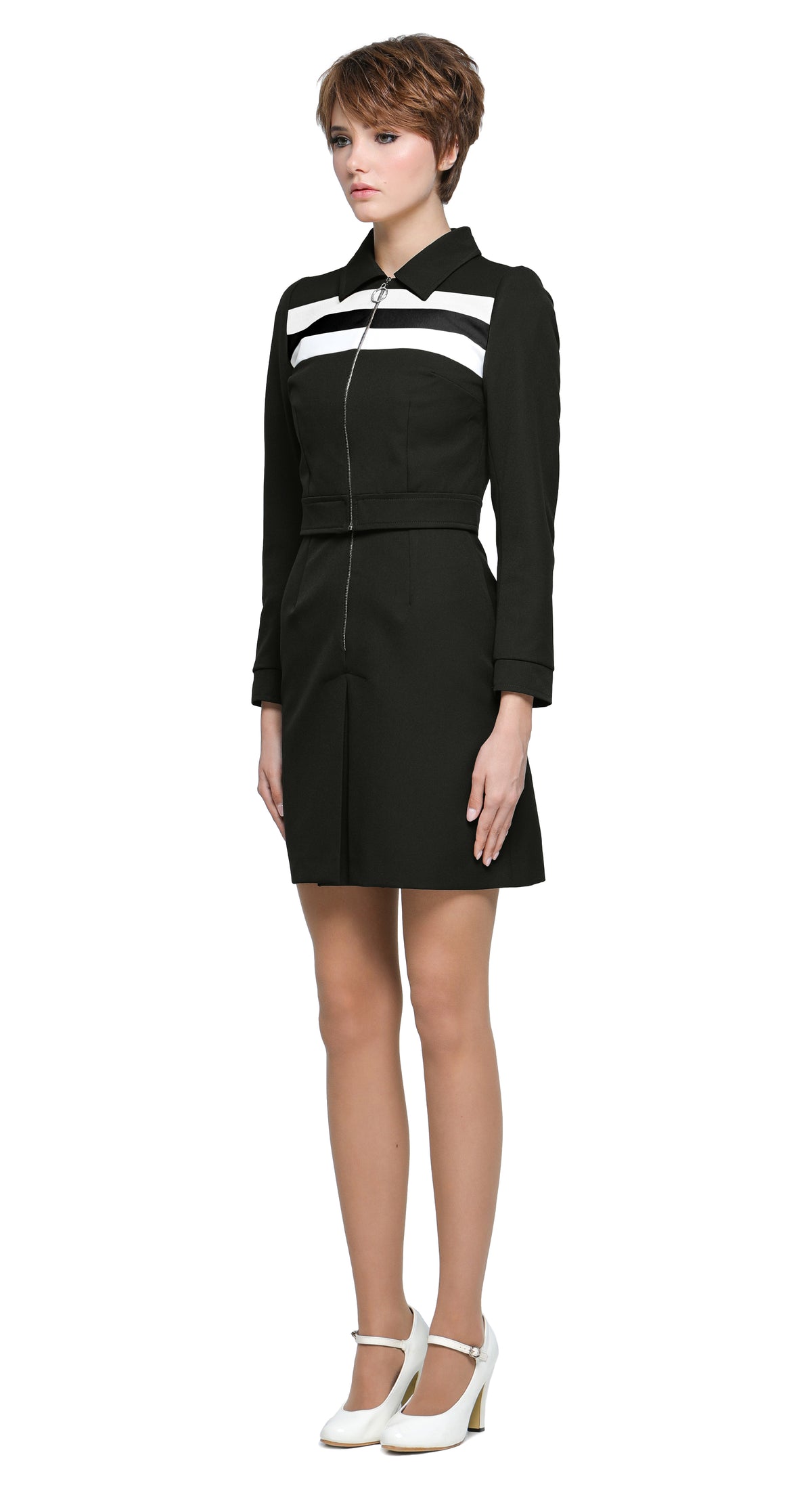 Definitely Maybe. A salute to an era of indisputable cool. A retro-inspired sporty look tweaked for today. A cropped jacket with a ring zipper pull and classic collar. Shown here in black/white; it’s made to be worn on its own or paired our 90s Britpop Inspired Black/White Dress with Waistline Stripes from this collection to elevate casual to high fashion.