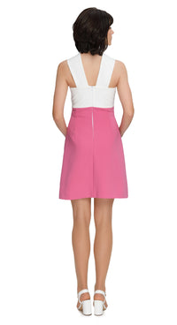  Introducing 1960s Style Pink/White Circle Cutout Dress; a charming addition to your wardrobe designed to capture the essence of the season. Crafted from a light and airy fabric, this dress features thick neck straps that stem from a subtle and creative circular loop detailing, adding a touch of uniqueness to the ensemble.