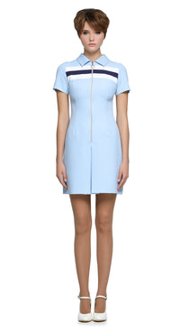 A nod to the swagger of Britain in the nineties. A playful and cool retro sporty-inspired silhouette with a classic shirting collar, front pleat, and retro zipper pull front closure. Striking contrast stripes for immediate retro charm. Worn down with your favorite kicks and a cardigan or dressed to kill with heels. A style that’s as fitting for a music festival as it is for your bestie’s big do.
Available in the shown baby blue or alternative color combinations. Please inquire
The model pictured is 180 cm