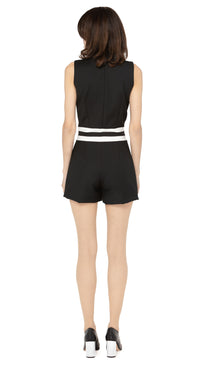 Introducing our spring 1970s style jumpsuit; an easily adaptable from work to play style, featuring waist level stripe detailing. This Italian stretch fabric is very comfortable with an aesthetic that can be worn casually or as a revised approach to what is a professional style for the warmer months.