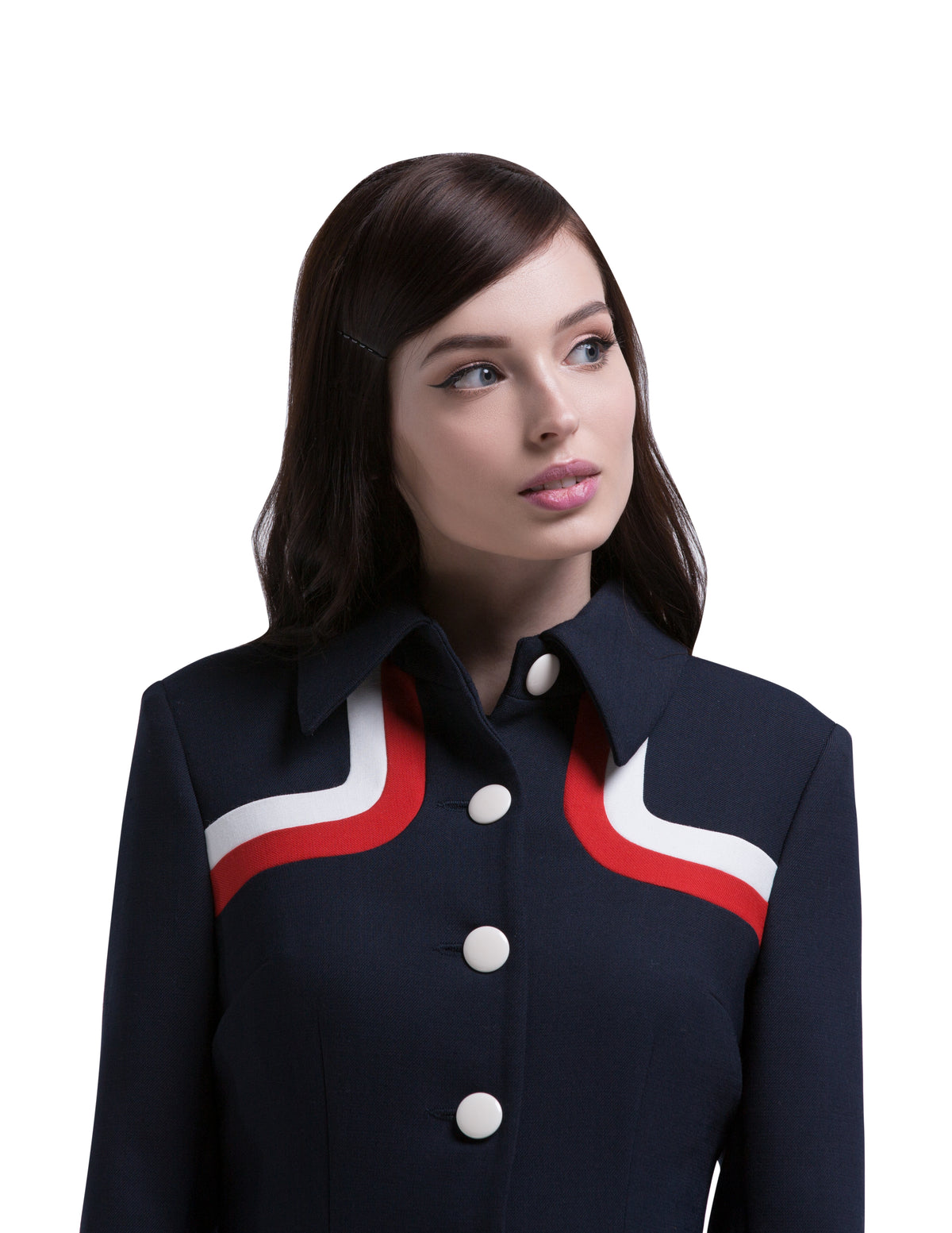 Another immediately sixties mod Autumn coat that allows for the timeless tri-colour of navy blue, red and light cream to produce a dramatic silhouette. A straight cut featuring a classic collar, fully lined Italian mill fabric, with functioning side pockets, animated white button front closure and a cool retro striped neckline.  An entrance maker over plain dresses within the tricolour colour range or paired perfectly with matching dress to complete this high fashion very wearable set.