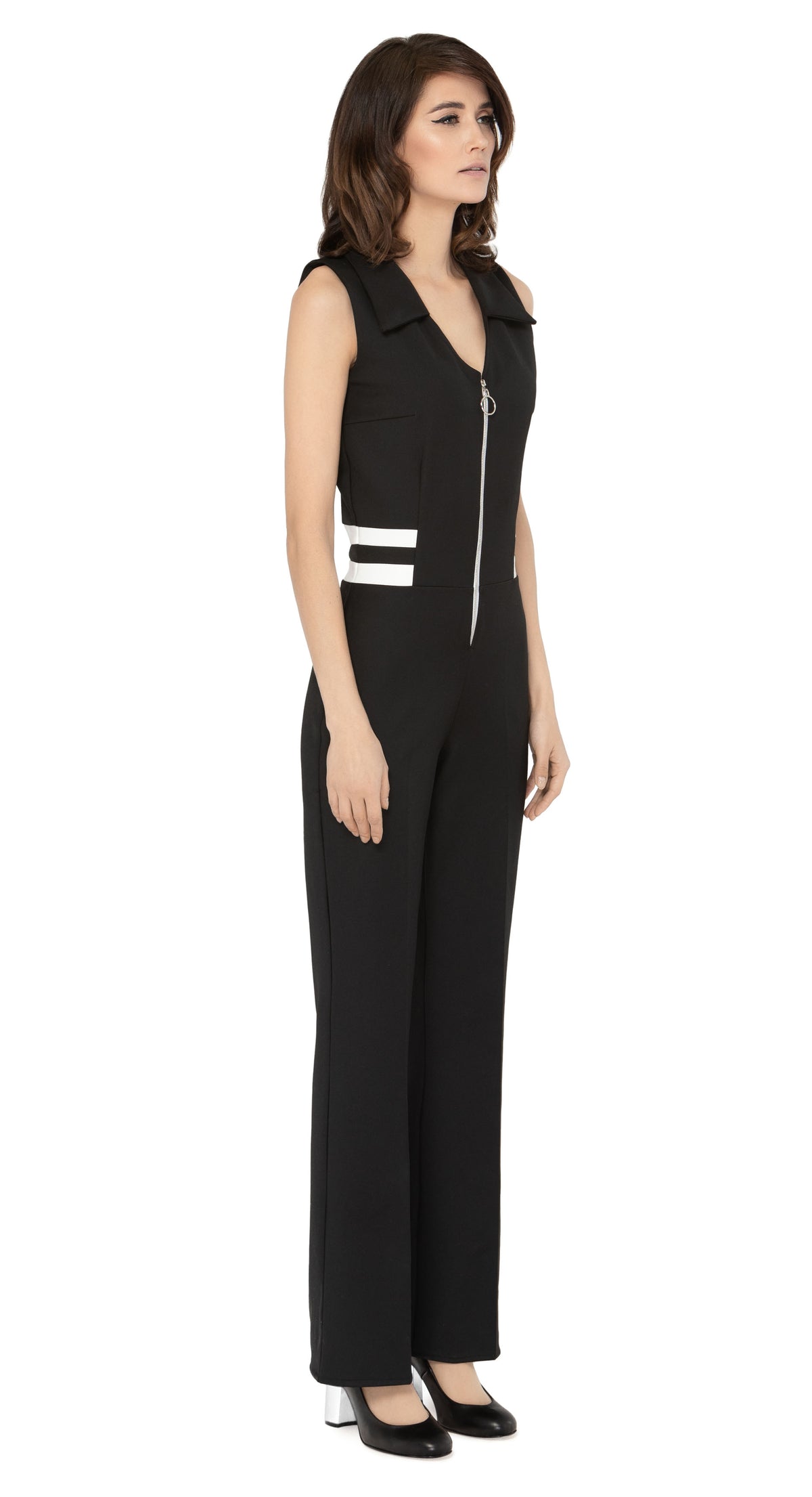 Introducing our spring 1970s style jumpsuit; an easily adaptable from work to play style, featuring waist level stripe detailing. This Italian stretch fabric is very comfortable with an aesthetic that can be worn casually or as a revised approach to what is a professional style for the warmer months.