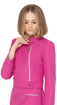 Our bold fitted fuchsia jacket is a statement piece that announces arrival. The stunningly tailored aesthetic of this jacket is immediately visible within the collar design and retro offset looped front zipper closure. Our seasoned pattern makers have outdone themselves with this superb example of a modern, cool aesthetic.