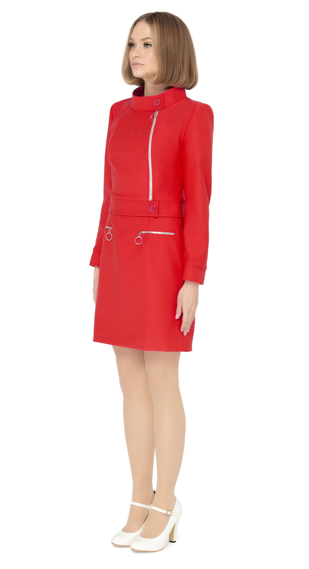 Our bold red jacket is a statement piece that announces arrival. The stunningly tailored aesthetic of this piece is immediately visible within the collar design and retro offset looped front zipper closure. Our seasoned pattern makers have outdone themselves with this superb example of a modern cool aesthetic. This set is made to be worn as an entrance-making ensemble when paired with 60s Style Red Dress with 4 Zippers from our spring collection.