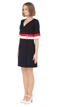 Elegant open neckline tri-colour work-or-play dress with navy blue as the primary colour leading into light cream and red bands on waistline and cuffs with two decorative gold coloured buttons.  Pairs perfectly with our Sixties Style Navy/Red/Light Cream Coat to complete a very wearable and versatile high fashion style for all occasions.