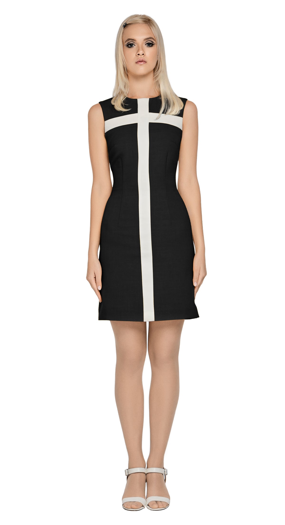 A classic, at work or play, fitted spring dress in black, with complimenting cream detail Italian fabric.  Simply elegant and very wearable when accessorized to suit. A light cream detachable bow assists in dressing this piece up or down.  This fully lined piece provides some stretch and has a back zipper closure.  Choose bespoke to add sleeves or for different colour combinations (please inquire).