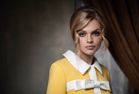 A classic Spring coat in black Italian fabric with complimenting cream detail. A light cream detachable bow assists in dressing this piece up or down.  This fully lined coat pairs perfectly with our 60s Style Light Black/Light Cream Dress.  Choose bespoke to for different colour combinations (please inquire).