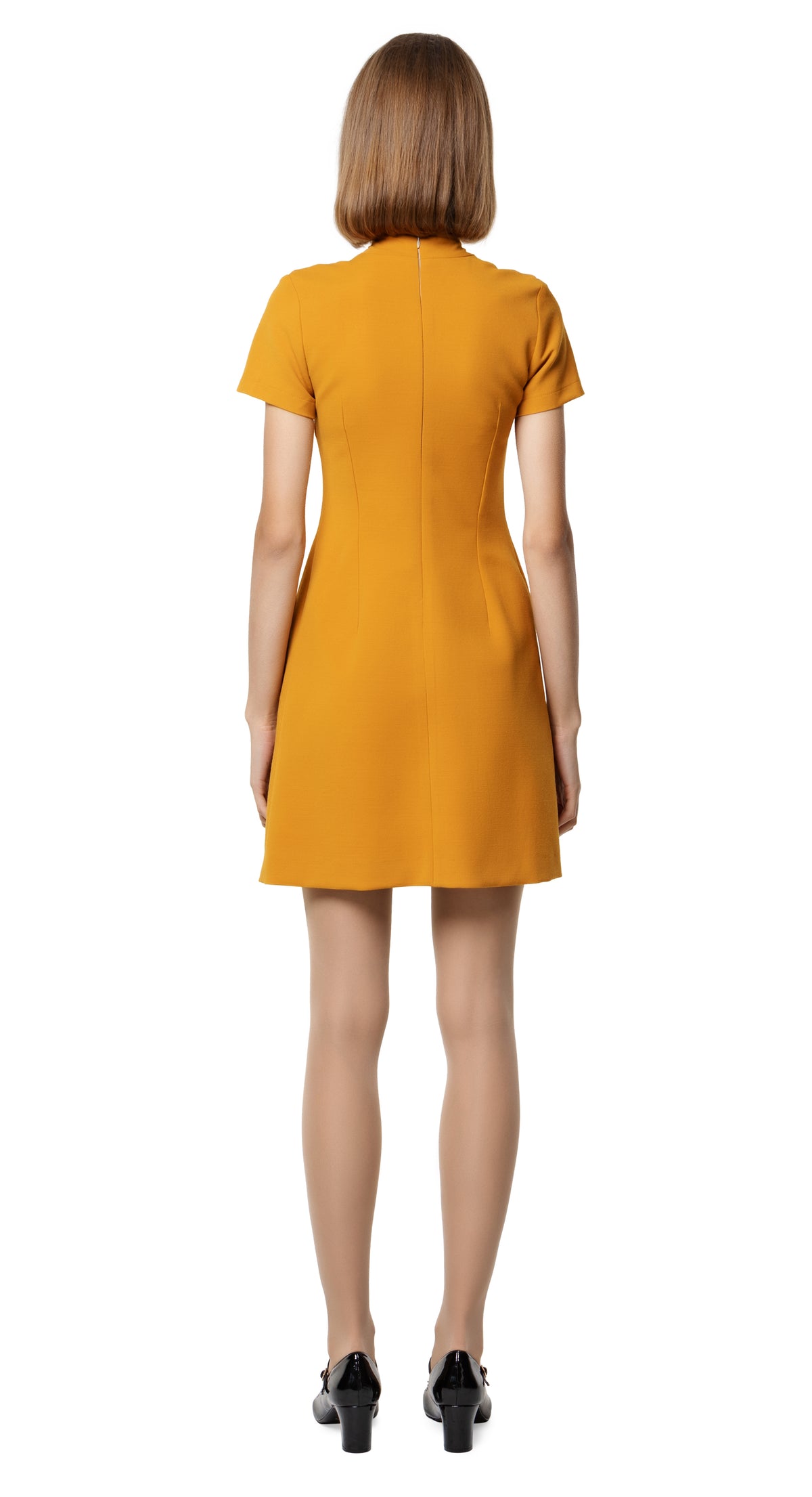 A classic sixties aesthetic; autumn dress with fitted torso, front pleat, a-line skirt, functional pocket, 5 button decorative detailing, stand away collar, beautiful topstitching & short sleeves.  Choose bespoke for any length of sleeve or hem or to alternate colour. Please feel free to contact us for colour availability.