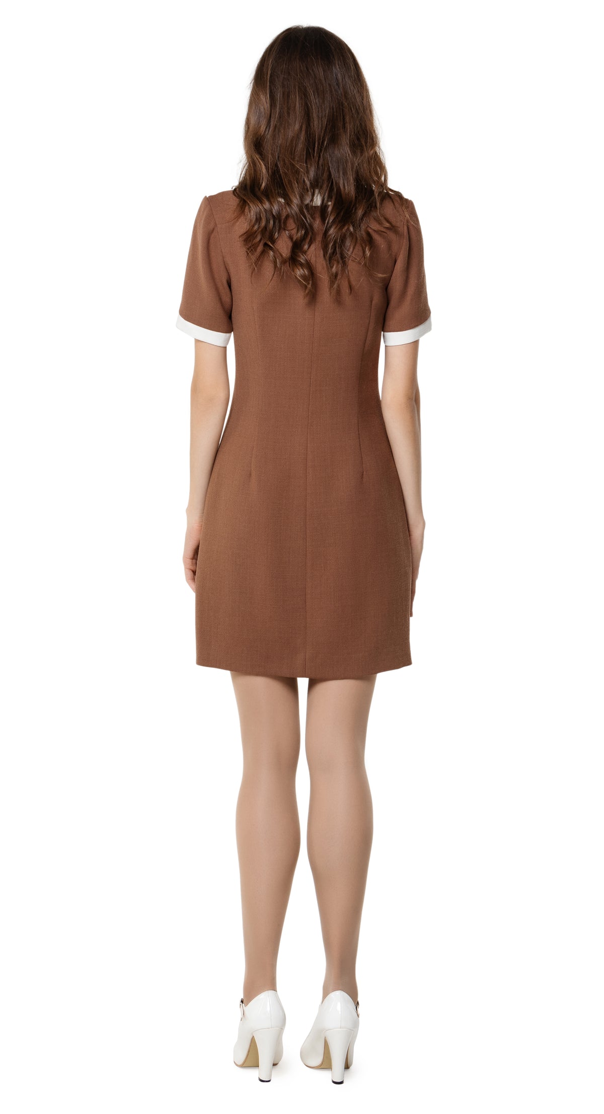 Fitted Autumn dress, drawing on a retro sport feel;  blending the style into a high fashion and very wearable autumn look.  The versatility of this style lends itself as a go-to for both day or night, office or event. A premium Spanish viscose/wool blend fabric, retro looped front zip closure, short sleeves and rounded neckline.  Choose bespoke to alternate sleeve and/or hem length.