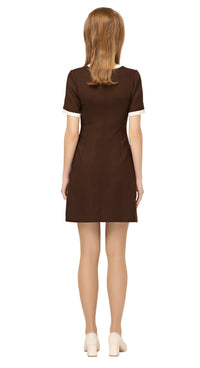 Fitted, fair weather dress, drawing on a retro sport feel & blending the style into a high fashion and very wearable Spring look.  The versatility of this style encourages this as a go-to for both day or night, office or event. A premium Spanish wool blend fabric, retro looped front zip closure, short sleeves and rounded neckline.  Choose bespoke to alternate sleeve and/or hem length.  Pairs perfectly as intended with our retro styled cropped Spring jacket.
