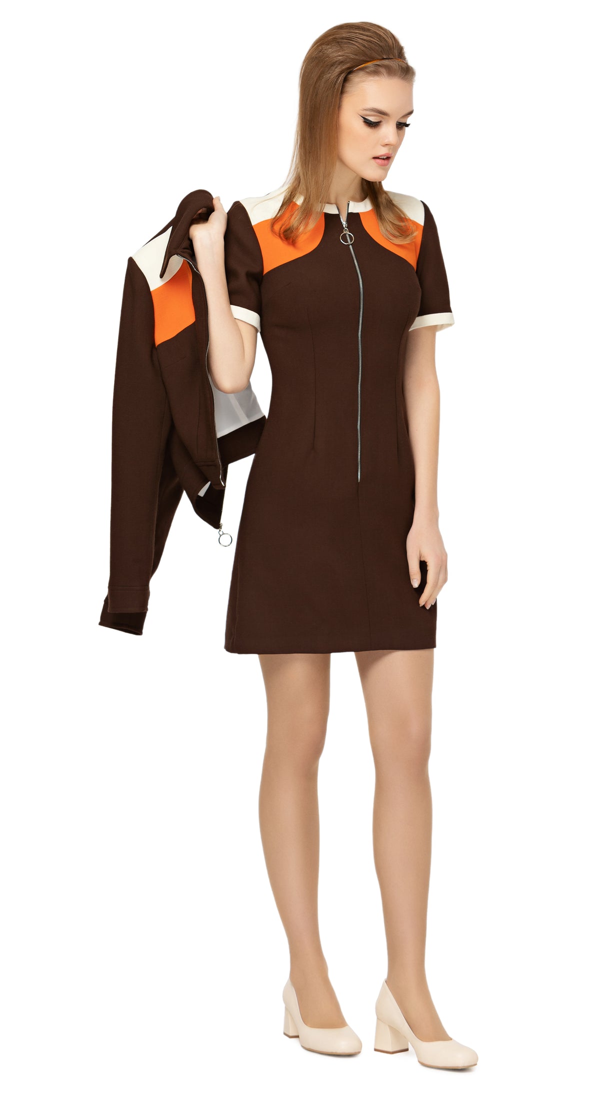 Fitted, fair weather dress, drawing on a retro sport feel & blending the style into a high fashion and very wearable Spring look.  The versatility of this style encourages this as a go-to for both day or night, office or event. A premium Spanish wool blend fabric, retro looped front zip closure, short sleeves and rounded neckline.  Choose bespoke to alternate sleeve and/or hem length.  Pairs perfectly as intended with our retro styled cropped Spring jacket.