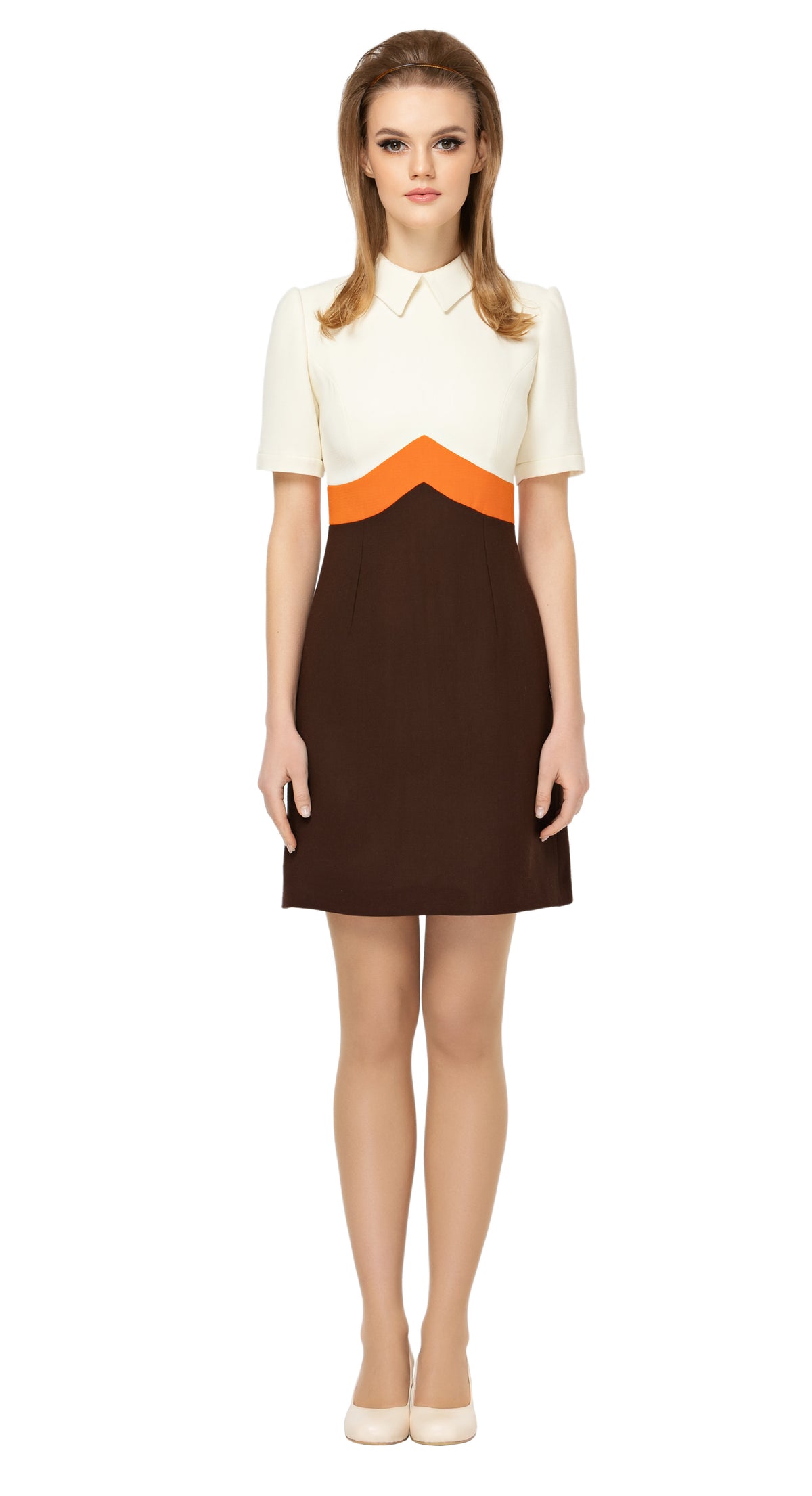 Fitted, retro fair weather dress in a tricolour theme with a chevron shaped division at the waist.  Invisible back zipper, classic collar and short, slightly puffed sleeves. An easy and comfortable piece without compromising on an immediately cool look for both day or night, work or play.  Premium Spanish wool blend fabric, fully lined.