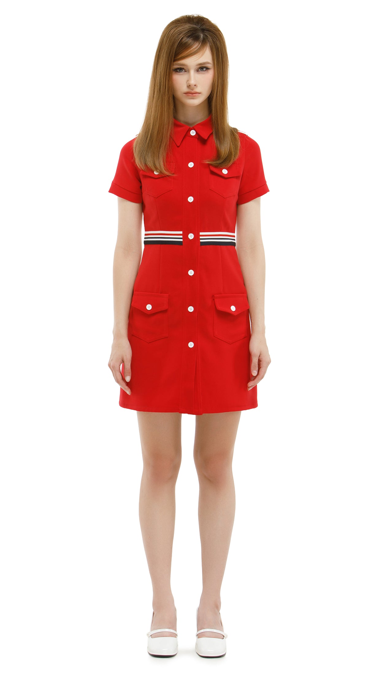Red dress with white buttons worn by a model on a white background