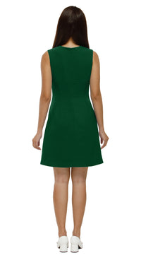 Green dress worn by a model on a white background