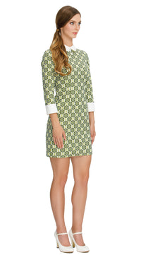 Step into timeless elegance with our Fitted, Shades of Green Floral Pattern Sixties Dress; perfect for both work and play. This dress features a charming floral pattern in shades of green, offering a delightful retro aesthetic. With three-quarter length cuffed sleeves and a classic white collar, it exudes vintage charm. 
