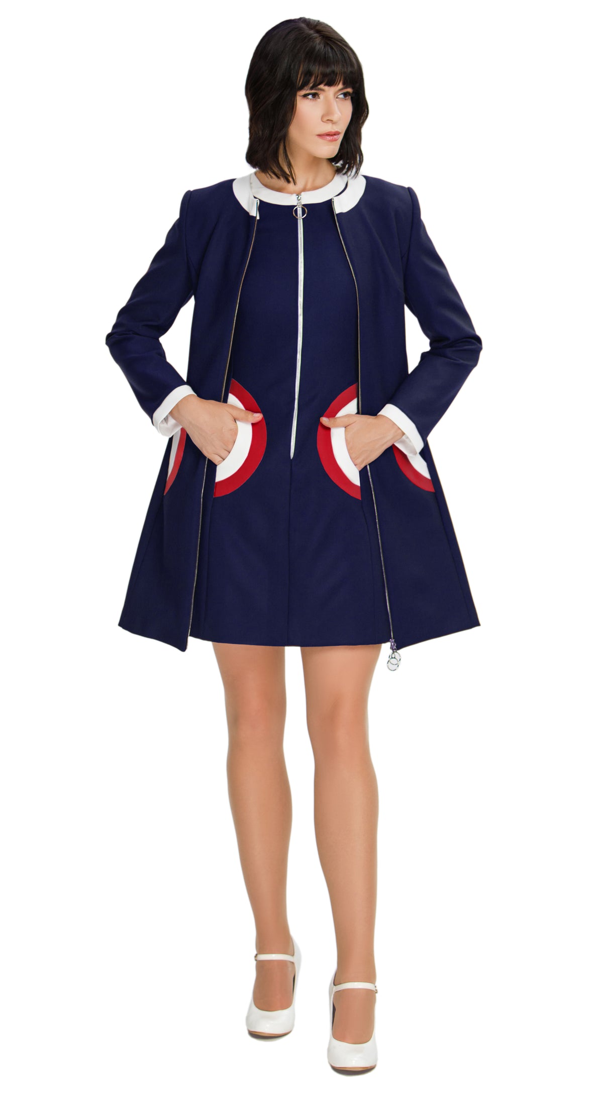 Our retro Inspired Autumn Coat; a playful nod to retro fashion that's perfect for the season. This coat captures the essence of the era through its color palette, charming detailing, and delightful playfulness. The front looped zipper closure adds a touch of authenticity, while the full-length sleeves and traditional rounded neck maintain the timeless appeal.
