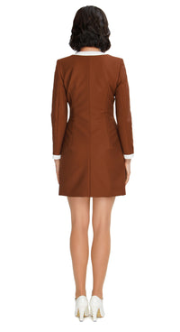 Our retro Inspired Autumn Coat; a playful nod to retro fashion that's perfect for the season. This coat captures the essence of the era through its color palette, charming detailing, and delightful playfulness. The front looped zipper closure adds a touch of authenticity, while the full-length sleeves and traditional rounded neck maintain the timeless appeal.