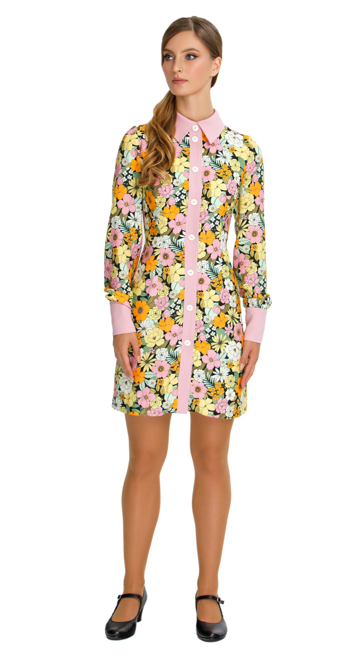 Vibrant Floral  Autumn Shirt Dress; a versatile and delightful addition to your wardrobe. This dress features a vibrant floral pattern that adds a casual elegance to your ensemble, making it perfect for both work and play. The classic pink collar, cuffs, and button down detailing provide a charming contrast against the floral backdrop.