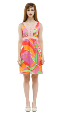 Woman wearing a colorful dress with a white background