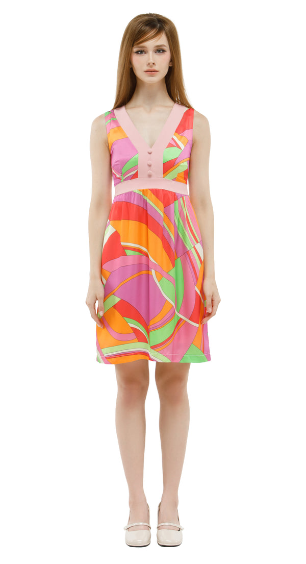 Woman wearing a colorful dress with a white background