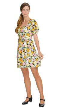 Embrace the essence of autumn with our Floral Autumn Sixties style, work or play dress; a stunning and immediately charming addition to your wardrobe. This dress features a deep square neckline, short slightly puffed sleeves, a gathered waist, and a subtle flair to the skirt, capturing the classic sixties silhouette. The vibrant floral pattern adds a touch of flair to your look.