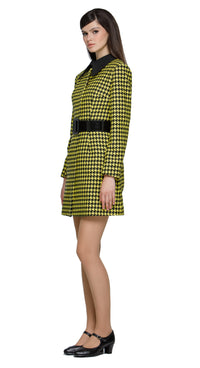 Fitted yellow/black houndstooth fair-weather coat featuring an oversized black buckled belt. A playful twist on a classic pattern, this coat brings bold, contrasting details to the forefront. Perfect for pairing with either our Black/Yellow Houndstooth Dress with Front Zipper Pull or our 60s Style Black/Yellow Houndstooth Skirt from this collection for an effortlessly chic and cool Autumn high-fashion vibe. Invisible snap closure. Made from heritage French mill fabric. 