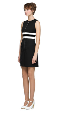 A nod to the swagger of Britain in the nineties. A playful and cool retro sporty-inspired silhouette with a sleeveless design, uniform front pleat  on the skirting, and retro ring zipper pull front closure. Colour band details around the waist add an extra pop of charm. Worn down with your favorite kicks and a cardigan or dressed to kill with heels. A style that’s as fitting for a music festival as it is for your bestie’s big doo. Matches perfectly with our 90s Britpop Inspired Black/White Jacket
Available 