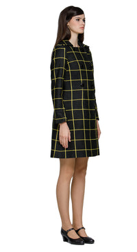 Stunning sixties-style double-breasted coat in a black/yellow weave, designed to match the Black/Yellow Dress with Square Neckline from this collection. It features a squared, structured neckline that complements the flow of the pattern and six black button details. An ideal layering piece for autumn with a bold, playful vibe. Made from a French heritage mill weave.