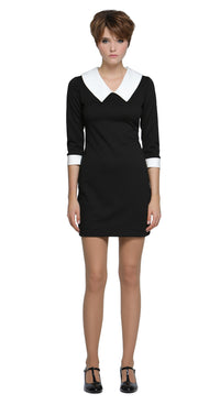 All-occasion, flattering-for-all-forms mod-style little black dress with oversized white collar and oversized big-buckle belt. Features contrast cuff detailing. Shown here with three-quarter length sleeves, but alternative sleeve options (sleeveless, short, or full) and hem lengths are available.