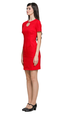 Achieve a confidence-boosting look with this versatile space age style, red fitted dress, designed to flatter all shapes and suit any season or purpose. Featuring imaginative top-stitch detailing, it showcases carpenter-style pockets. A unique circular cut-out design complements the rounded neckline, adding a modern focal point. 
The dress features a rear invisible zipper for a sleek fit and is shown here with short sleeves, though it’s available in mid to long sleeve options and customizable hem lengths. A