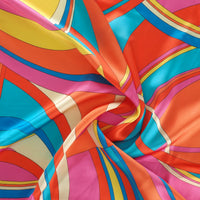 Colorful fabric with multicolored  1960s Pucci style pattern.