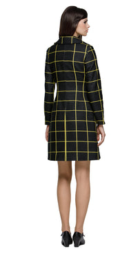 Stunning sixties-style double-breasted coat in a black/yellow weave, designed to match the Black/Yellow Dress with Square Neckline from this collection. It features a squared, structured neckline that complements the flow of the pattern and six black button details. An ideal layering piece for autumn with a bold, playful vibe. Made from a French heritage mill weave.