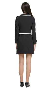 Cropped autumn classic-look jacket with contrasting detailing across the hem and collar, six-button detail, and contrasting outlined cuff epaulettes. A versatile piece to pair with a plain skirt or pants, but also pairs seamlessly with our Classic Black Dress with White Trim from this collection, offering a chic, wearable option for both leisure and professional looks.