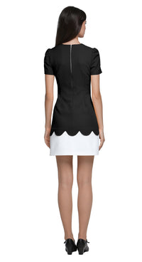 Achieve an easy to reach for stunning look with this fitted vibrant retro event dress, featuring subtle white bow detailing over a neckline cutout. The bold orange torso leads to beautifully crafted top-stitch finished scalloped detail, complemented by a short white skirt. This versatile piece suits heels for an elegant night out but also lends itself perfectly to flats and kicks for a more casual vibe.
Available in alternative sleeve and hem lengths, as well as a variety of colors, this dress is designed t
