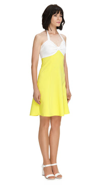 Embrace spring with our 70s Style Light Spring Halter Dress in bright yellow. Versatile and flattering, dress it up or down for any occasion. Shop now for effortless Spring style!