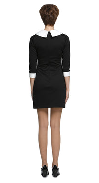 All-occasion, flattering-for-all-forms mod-style little black dress with oversized white collar and oversized big-buckle belt. Features contrast cuff detailing. Shown here with three-quarter length sleeves, but alternative sleeve options (sleeveless, short, or full) and hem lengths are available.