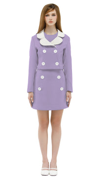 Woman wearing a lavender/white mod 1960s dress and jacket on a white background
