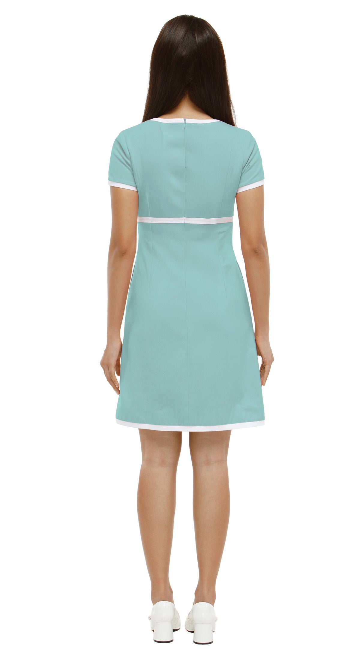 Woman wearing a  mint green, Mod 1960s style dress with white accents, 2 diamond cutouts and 2 small bows on a white background