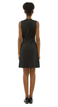 Black sleeveless dress worn by a model on a white background