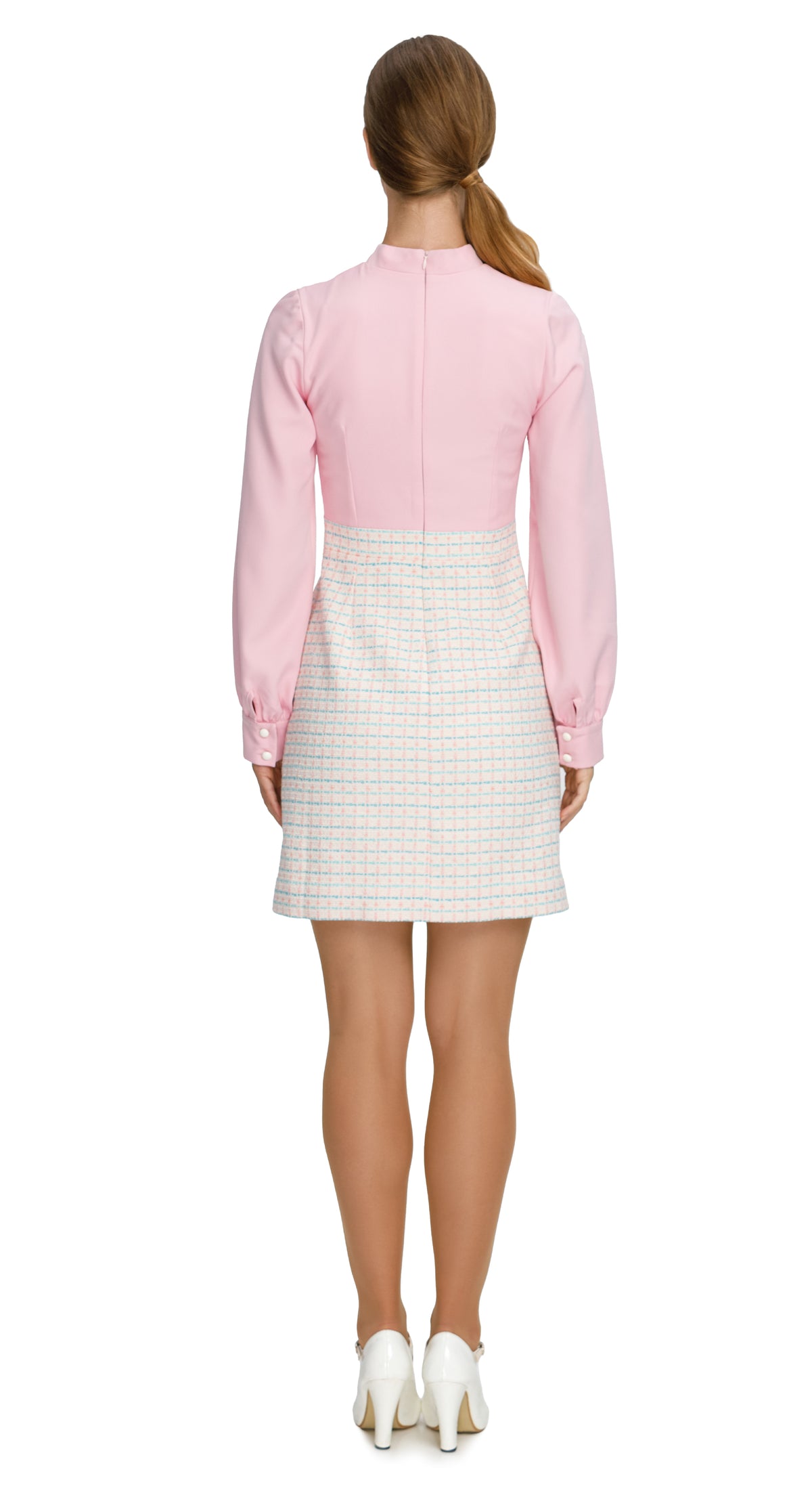 Charming and sophisticated, our ecru/pink/blue boucle dress offers a modern twist on classic elegance. Crafted from soft pink fabric top and boucle bottom, it provides comfort without sacrificing style. The long sleeves boast fitted cuffs for a tailored appearance, while the bow detailing adds a playful touch.