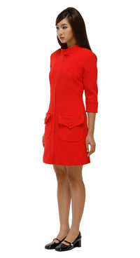 Woman wearing a red dress suit on a white background