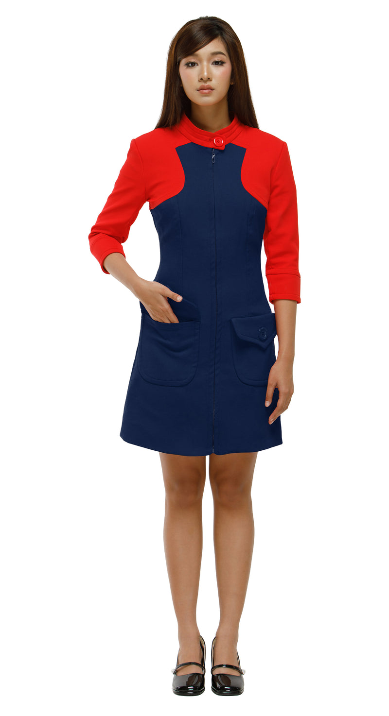 Woman wearing a red and blue dress on a white background