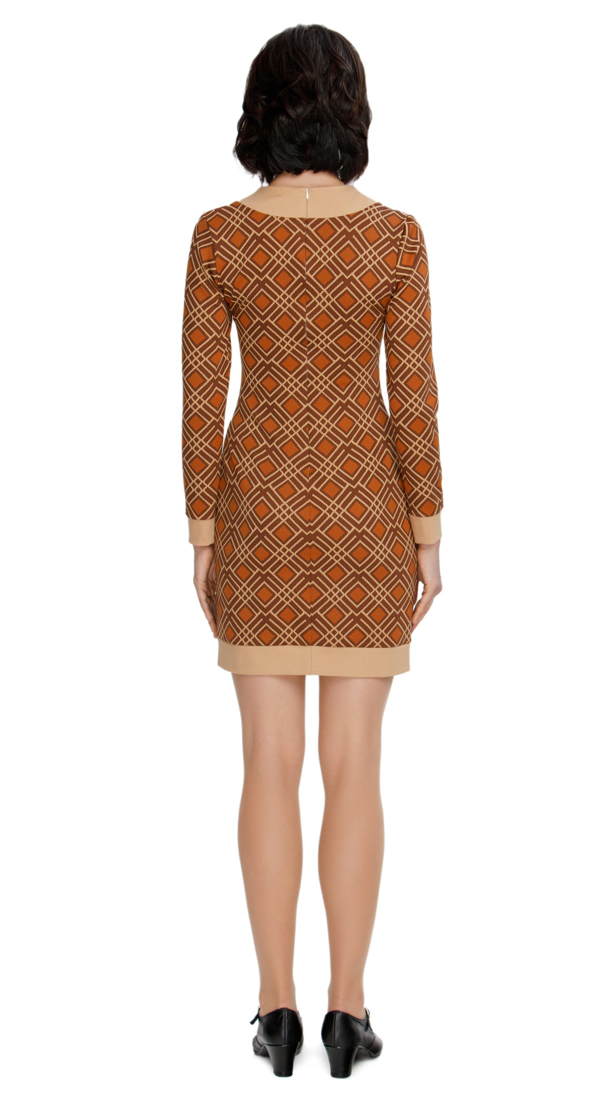 Indulge in seventies nostalgia with our Fitted Jersey Retro Style Autumn Dress, showcasing a rich autumn color, distinctive print, and striking beige accents. This dress features full sleeves for extra warmth and a classic round collar with a offering an authentic vintage vibe. Comfortable and effortlessly chic, it's your go-to choice for a smooth shift from daytime to a captivating evening look in the autumn season.